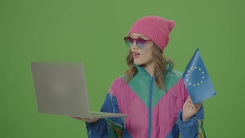 Woman with Laptop and EU Flag on Green Screen