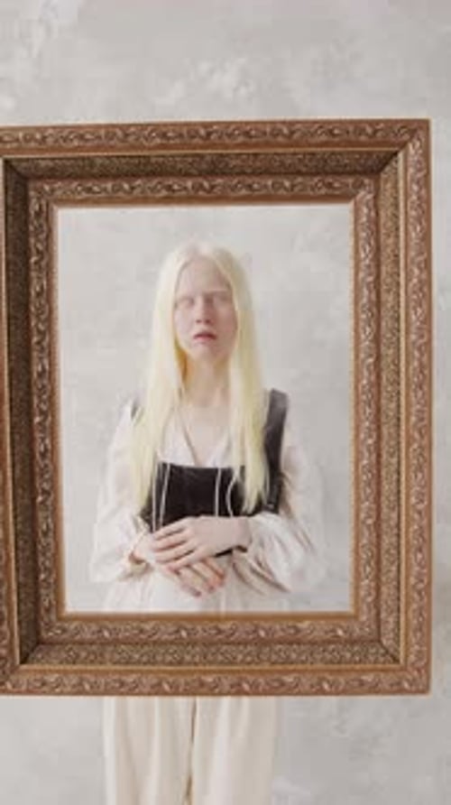 Woman Posing in a Picture Frame