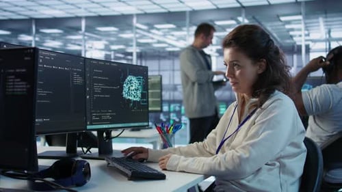 Developer Listening Music While Programming in AI Data Center