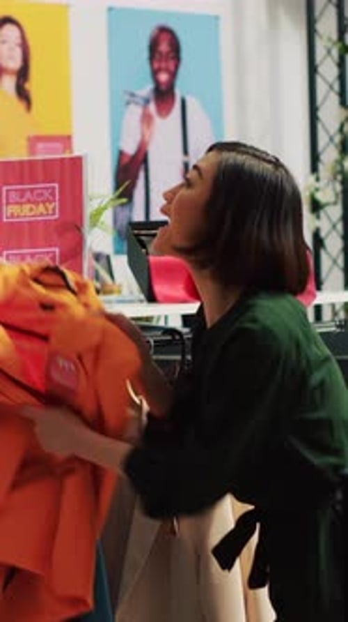 Vertical Video Black Friday Fight in Clothing Store