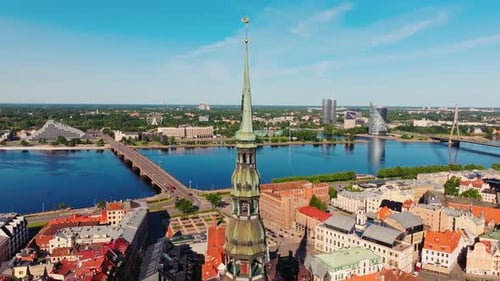 Riga Old Town With St Peters Church and Daugava – Slow Forward Drone Motion