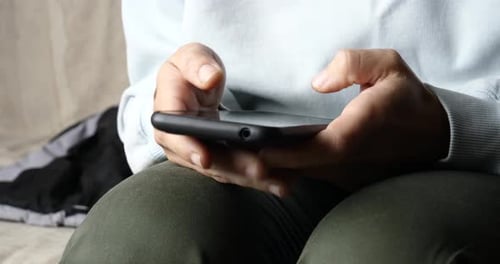 Girl Hand Typing Phone Closeup