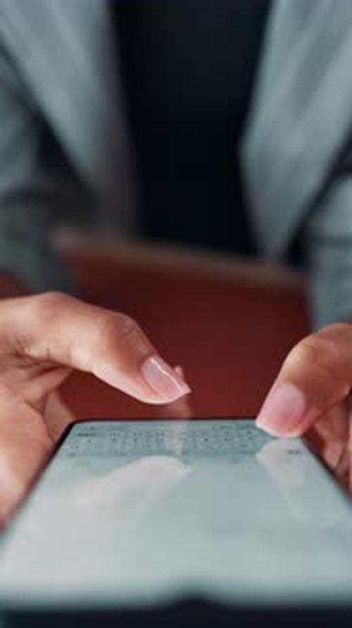 Woman Types on Smartphone in Office Close Up