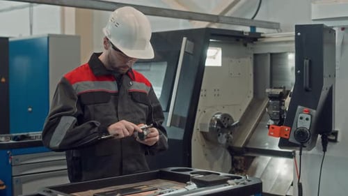 Male Plant Technician Doing Machinery Equipment Repairs
