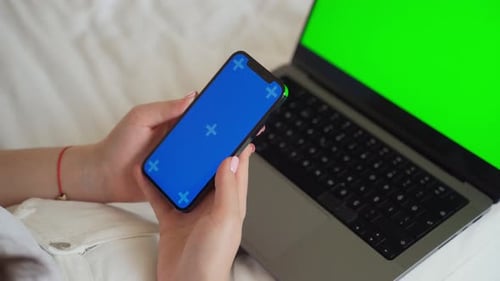 Close Up Teenage Hands Using Smartphone Green Blank Blue Screen Chroma Key