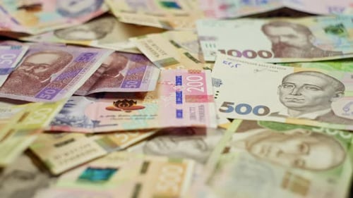 Pile of Colorful Ukrainian Hryvnia Banknotes Close Up