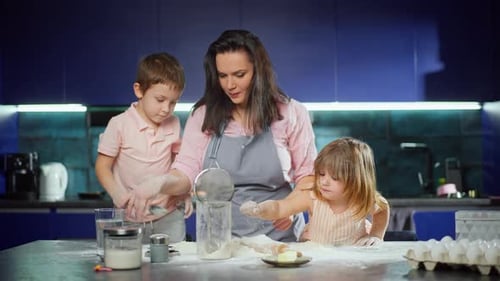 Family Baking Together in a Modern Kitchen
