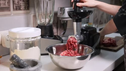 Electric Meat Grinder Processes Beef Into Minced