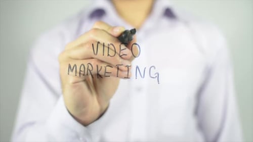 Hand Writing Video Marketing on Glass