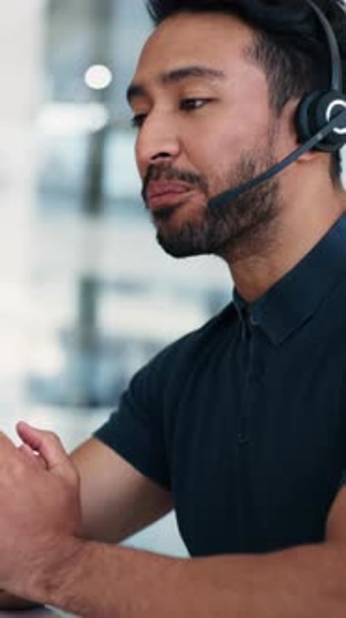 Headset, man and call center agent in office with online consultation, conversation or crm