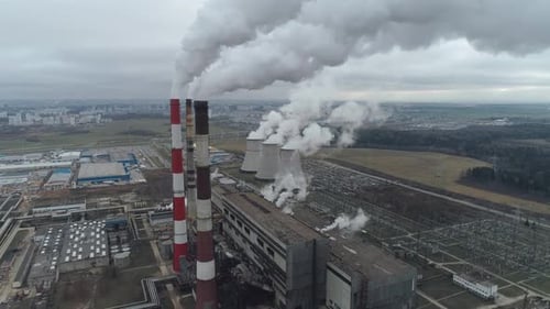 Thermal Power Energy Station View From Height to Pipes in Fog Steam and Smoke From Pipes