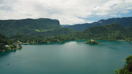 Panoramic aerial view of Lake Bled with its island, church and mountains