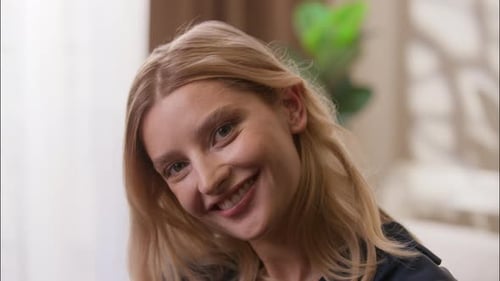 Close Up of Smiling Woman in Home Setting