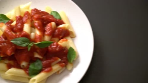 Penne pasta in tomato sauce - Italian food style