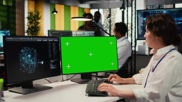 Green Screen PC Used By Technician in Office Using AI to Optimize ...