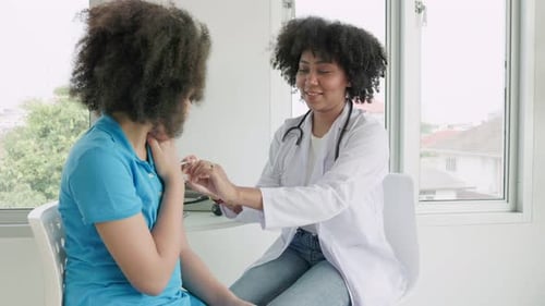 Doctor Examining Patient, Giving Encouraging High Five