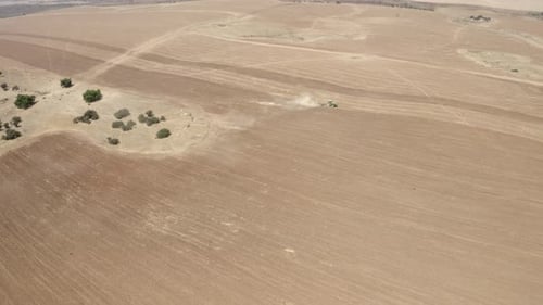 Tractor tilling in Judea Plain, Drone footage, Israel