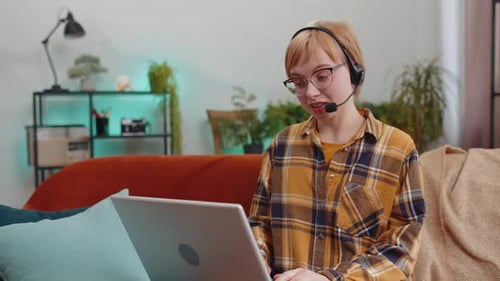 Young Woman Freelance Worker Call Center Support Service Operator Helpline Having Talk with Client