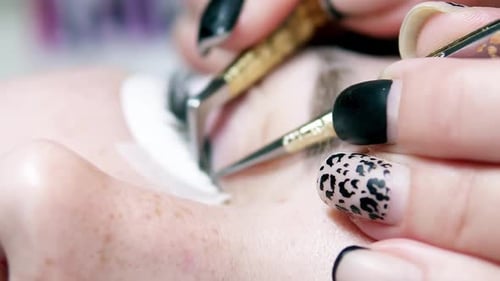 Applying Individual Eyelash Extensions with Fine Tweezers