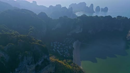 Towering Limestone Cliffs On Ao Nang During Foggy Morning In Krabi Province, Southern Thailand. Aeri