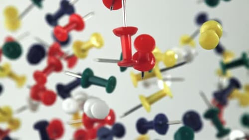 Multicolored Paper Clips Fly Up and Fall Down Filmed on a Highspeed Camera at 1000 Fps