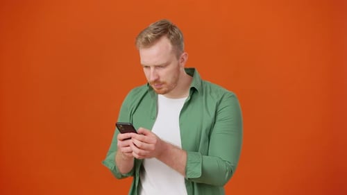 Ecstatic Man Satisfied with Money Won in Online Casino