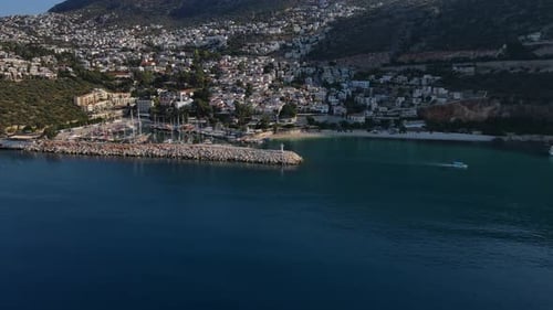 Aerial Beautiful Blue Ocean with the Coastal Town of Kalkan in the Background