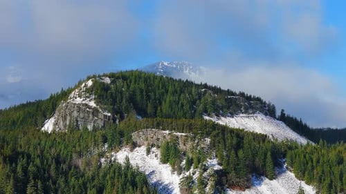 Aerial View on Canadian Rocky Mountain Landscape Covered in Snow