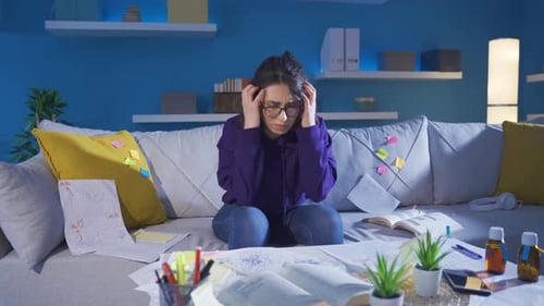 Stressed Student Studying Late into the Night