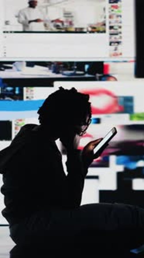 Vertical Video Teenager Procrastinating on Internet Using Social Media App on Phone