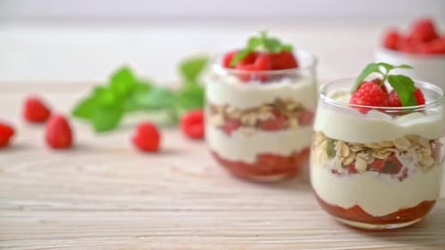 fresh raspberry and yogurt with granola - Healthy food style