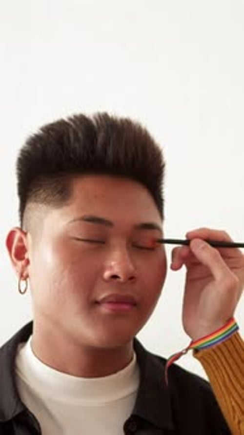 Applying Makeup to Eyelid with Brush