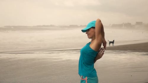 Sporty Woman Exercising, Stretching Arms On Beach, Super Slow Motion 240fps