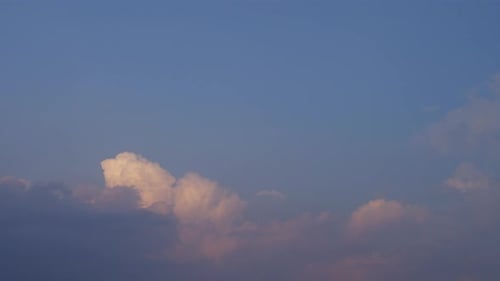 TIME LAPSE OF CUMULU NIMBUS CLOUDS AT SUNSET