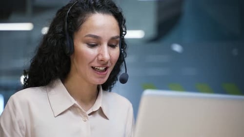 Woman Wearing Headset Talking During Video Call