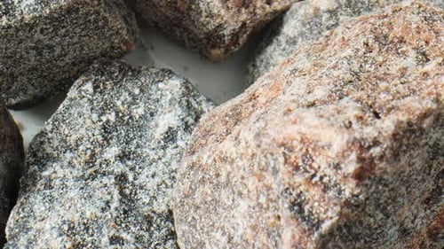 Textured Rocks with White Granular Covering Close-Up