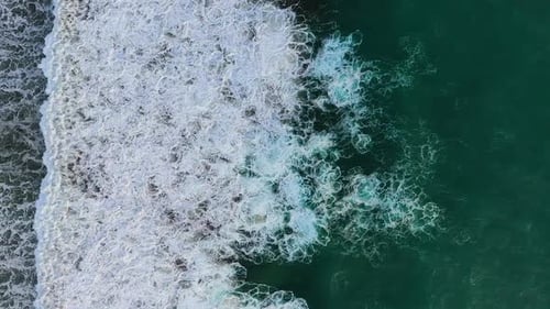Aerial view of sandy beaches and waves, Portugal.