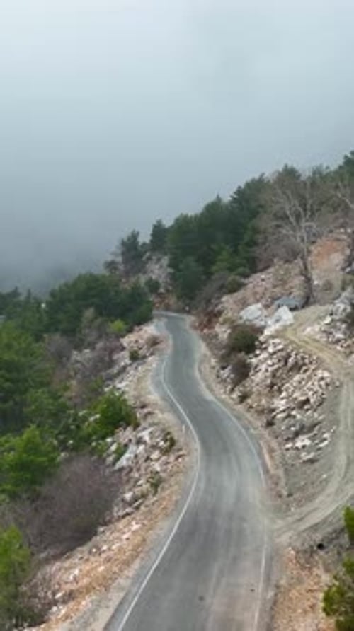 Vertical Video Cloudy Landscape in the Mountains Aerial View