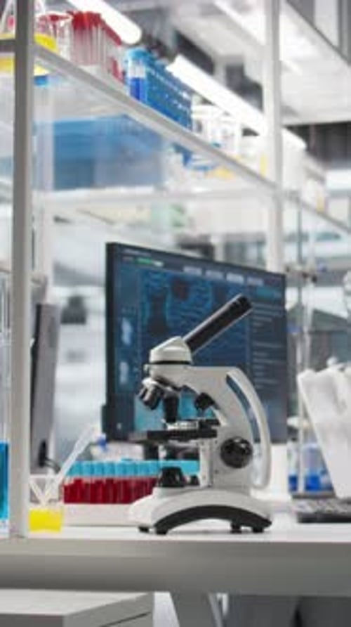 Microscope in a Clean Modern Medical Laboratory