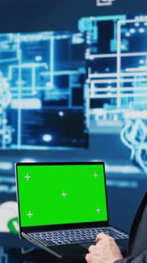 Vertical Video Professional Man Ensures Artificial Intelligence Algorithms with Mockup Screen