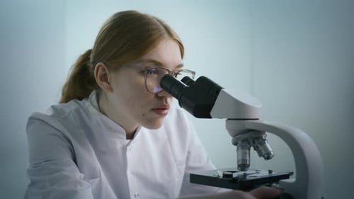 Close Up Portrait of Biotechnology Scientist Woman Developing Drugs Biochemist