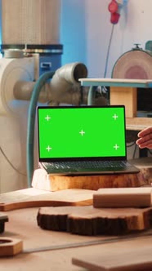 Vertical Video Craftsperson and Coworker Designing Custom 3D Furniture on Chroma Key Notebook