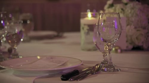 Close Up View of Restaurant Banquet Table Set Up Served Dinner Tableware and Silverware on Event