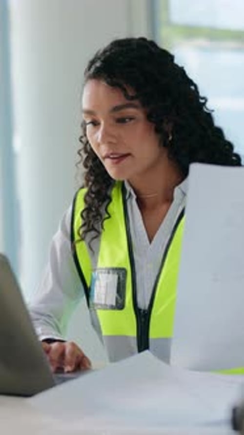 Architecture, paperwork and woman on laptop for construction, floor plan or building project