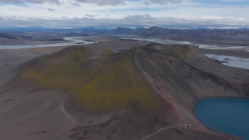 Aerial View of Iceland's Volcanic Crater with Blue Lake and Rivers