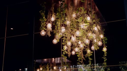 Unique Lighting Fixture with Ivy and Vintage Bulbs