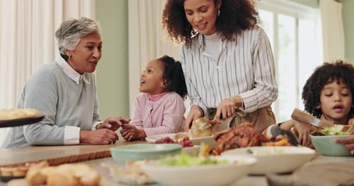 Family Gathering Around Table with Food