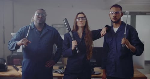 Defiant Group Holding Baseball Bat and Tools