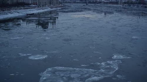 Icy Danube River With The Majestic Hungarian Parliament Building On Its Banks In Budapest, Hungary.