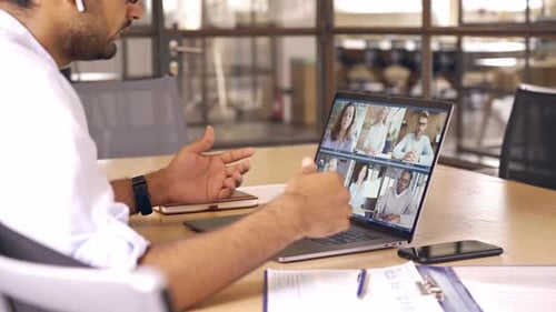 Indian Business Man Having Virtual Team Meeting on Video Conference Call Using